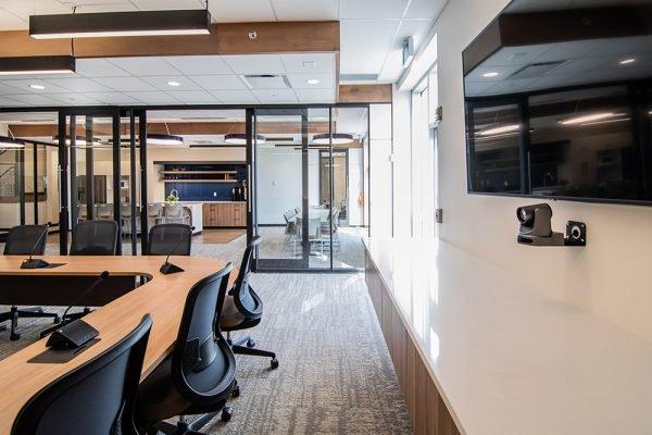 a conference room with a large table and chairs